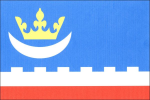 List tvoří tři vodorovné pruhy, modrý, zubatý bílý a červený, v poměru 5 _ 1 _ 1. V žerďové polovině modrého pruhu bílý půlměsíc cípy k hornímu okraji listu převýšený žlutou korunou. Bílý pruh má šest obdélníkových zubů vysokých polovinu jejich šířky a sedm stejných mezer. Poměr šířky k délce listu je 2 _ 3. Vlajka Pecka