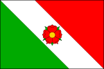 List praporu tvoří zelené pole ve tvaru zeleného rovnoramenného trojúhelníku s vrcholem v dolním žerďovém rohu, bílé středové kosé pole s rožmberskou červenou růží z městského znaku uprostřed a červené pole ve tvaru rovnoramenného trojúhelníku v horním vlajícím cípu. Šířka bílého pole je na horním a dolním okraji listu rovna jedné třetině délky listu. Poměr šířky praporu k délce je 2_3. Vlajka Radnice