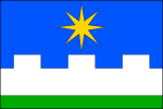 List tvoří tři vodorovné pruhy, modrý, zubatý bílý a zelený, v poměru 5_2_1. V modrém pruhu žlutá osmicípá hvězda. Bílý pruh má tři obdélníkové zuby, dvě stejné a dvě poloviční mezery; zuby jsou vysoké jednu osminu šířky listu. Poměr šířky k délce listu je 2_3. Vlajka Uhlířské Janovice
