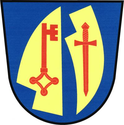 V modrém štítě vztyčená doleva obrácená radlice a postavené krojidlo, obojí zlaté. V radlici vztyčený gotický klíč zuby doleva, v krojidle postavený meč, obojí červené. Znak Božice