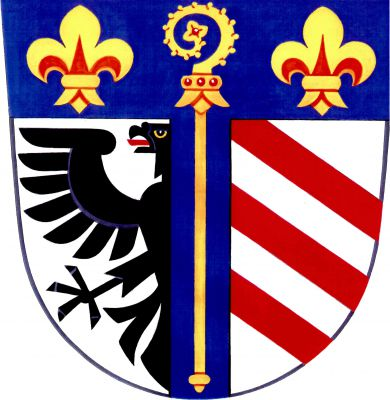Ve stříbrném štítě pod modrou hlavou modrý kůl se zlatou berlou závitem doprava, provázenou v hlavě štítu zlatými liliemi. V pravém poli vyniká půl černé orlice s červeným jazykem, v levém tři červená kosmá břevna. Znak Brankovice