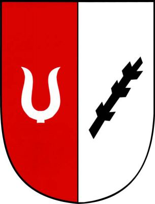 V červeno-stříbrně polceném štítě vpravo stříbrné vidle - podávky bez násady, vlevo šikmá černá ostrev. Znak Částkov