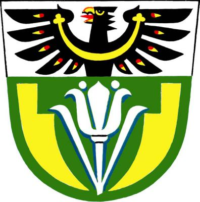 Ve stříbrno-zeleně zvýšeně děleném štítě nahoře vyrůstající černá plamenná orlice se zlatým zobákem a jetelovitě zakončeným perizoniem, dole stříbrná přirozená lilie na stonku se dvěma listy, provázená dvěma zlatými přivrácenými krojidly. Znak Čelechovice