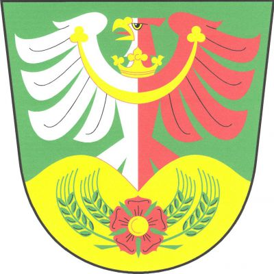 V zeleném štítě vyrůstá ze zlatého dvojvrší stříbrno-červeně polcená orlice se zlatým, jetelovitě zakončeným perizoniem, zlatou zbrojí a červeným jazykem a zlatou korunkou na krku. V dvojvrší červená růže se zlatým semeníkem a zelenými kališními lístky, podložená dvěma zkříženými dvojicemi zelených obilných klasů do oblouku. Znak Chrbonín