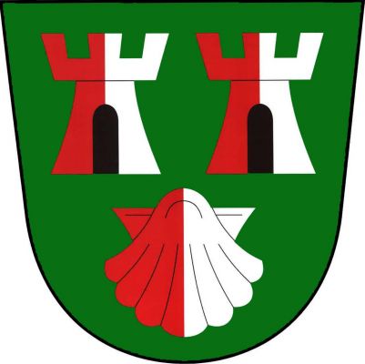 V zeleném štítě nahoře vedle sebe dvě věže s černými obloukovými branami a cimbuřím o třech stínkách, dole svatojakubská mušle, vše červeno-stříbrně polceno. Znak Drahoňův Újezd