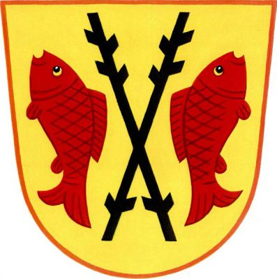Ve zlatém štítě zkřížené černé ostrve, provázené dvěma odvrácenými červenými kapry hlavami k hornímu okraji. Znak Dyjákovice