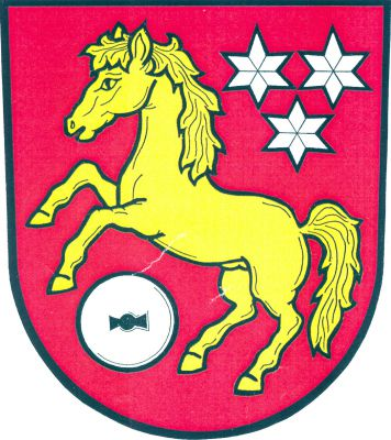 V červeném štítě zlatý kůň ve skoku provázený vlevo nahoře třemi (2,1) stříbrnými hvězdami a vpravo dole stříbrným mlýnským kamenem s černou položenou kypřicí. Znak Hlavnice