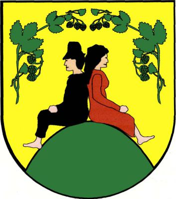 Ve zlatém štítě na zelené hoře sedí dvě zády se opírající bosé postavy, vpravo muž s černými vlasy v černém klobouku, haleně a kalhotách, vlevo žena s černými vlasy v červených šatech. Nad nimi do oblouku dvě zelené chmelové větve. Znak Hořesedly