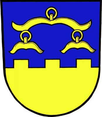V modrém štítě nad zlatou hradbou s cimbuřím vozové váhy se dvěma brdečky, vše zlaté. Znak Hrádek