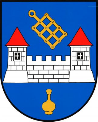V modrém štítě volný stříbrný kvádrovaný hrádek se dvěma věžemi na soklech uprostřed spojenými hradbou. Každá věž má černé okno a červenou kuželovou střechu. Nad hradbou kosmo rošt, pod hrádkem karafa se zátkou, vše zlaté. Znak Hrádek