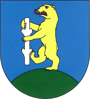 V modrém štítě na zeleném návrší zlatý medvěd ve skoku s červeným jazykem držící vztyčenou stříbrnou ostrev. Znak Hrobčice
