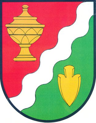 V červeno-zeleně šikmým stříbrným vlnitým břevnem děleném štítě vpravo dóza na masti, vlevo čelně postavená radlice, obojí zlaté. Znak Jeřice