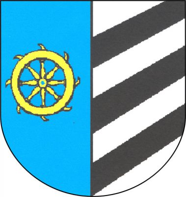V modro-stříbrně polceném štítě vpravo zlaté mlýnské kolo, vlevo tři šikmá černá břevna. Znak Jesenice