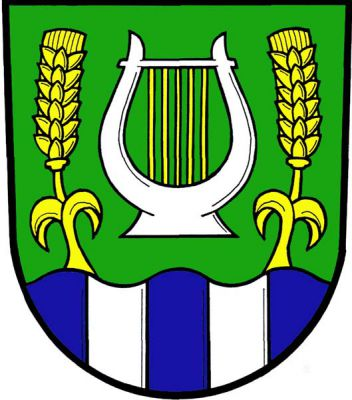 V zeleném štítě nad modrou vlnitou patou se dvěma stříbrnými kůly stříbrná lyra s pěti zlatými strunami provázená dvěma vyrůstajícími, přivrácenými zlatými obilnými klasy. Znak Kaliště