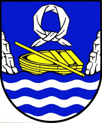 Štít vlnitě dělený, nahoře modrý, dole se šesti vlnitými pruhy, střídavě modrými a stříbrnými, na nichž mezi dvěma stříbrnými skalami pluje zlatá loďka s kosmo přeloženým zlatým bidlem. Nad loďkou je stříbrný vázaný šátek sv. Ludmily. Znak Kamenný Přívoz