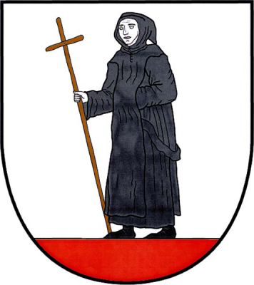 Ve stříbrném štítě na červené patě benediktin v černém řádovém oděvu s kapucí, opírající se pravicí o dřevěnou hůl zakončenou křížem přirozené barvy. Znak Klášterská Lhota