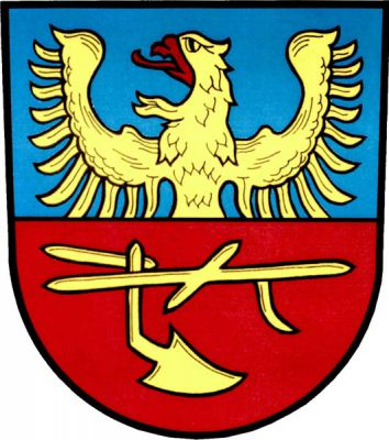 V modro-červeně děleném štítě nahoře vyrůstající zlatá orlice s červenou zbrojí, dole zlatý pruh bez kol obrácený doleva. Znak Komorní Lhotka