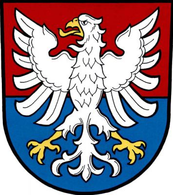 V červeno-modře děleném štítě stříbrná orlice se zlatou zbrojí. Znak Kralice na Hané