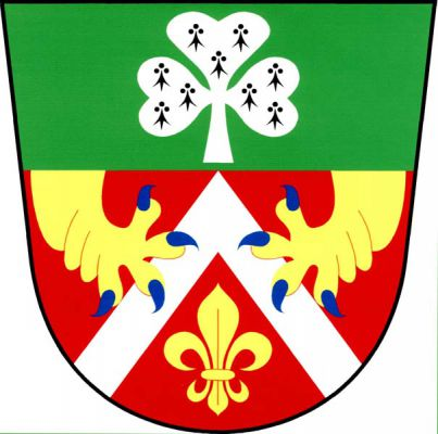 V zeleno-červeně zvýšeně děleném štítě nahoře hermelínový trojlístek, dole stříbrná krokev držená dvěma shora do oblouku vynikajícími zlatými lvími tlapami s modrou zbrojí, pod ní zlatá lilie. Znak Loukov