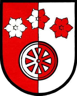 V červeno - stříbrně polceném štítě železniční kolo převýšené do oblouku třemi šestilistými květy bledule, vše opačných barev. Znak Lovečkovice