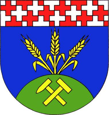 V modrém štítě pod stříbrnou hlavou posetou dotýkajícími se červenými křížky vyrůstají ze zeleného návrší se zlatými zkříženými hornickými kladívky tři zlaté obilné klasy. Znak Lubná