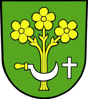 V zeleném štítě tři zlaté luční květy na stoncích, krajní odkloněné, dole přeložené položeným stříbrným srpem se zlatou rukojetí ostřím nahoru, provázeným vlevo stříbrným latinským křížem. Znak Lučice