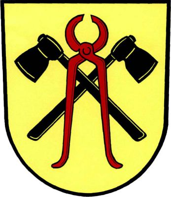 Ve zlatém štítě červené kleště podložené dvěma zkříženými černými sekerami. Znak Ludvíkov