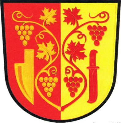 V červeno-zlatě polceném štítě ze středu vyrůstající dva révové pruty, každý se dvěma hrozny a dvěma listy opačných barev, provázené vpravo zlatou radlicí, vlevo červeným vinařským nožem hrotem dolů. Znak Moravská Nová Ves