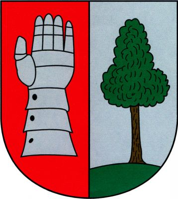V červeno-stříbrně polceném štítě vpravo vztyčená stříbrná levá rukavice - plechovice, vlevo ze zeleného návrší vyrůstající listnatý strom přirozené barvy. Znak Nový Ples