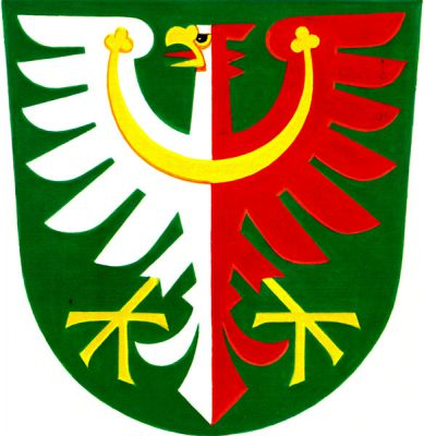 V zeleném štítě stříbrno-červeně polcená orlice se zlatým perizoniem, zbrojí a červeným jazykem. Znak Olbramovice