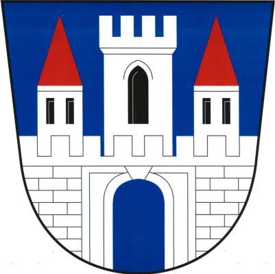 V modrém štítě stříbrná kvádrovaná hradba s prázdnou branou. Z hradby vyniká věž s cimbuřím a gotickým oknem, provázená dvěma nižšími věžemi s červenými kuželovými střechami, každá se dvěma okny vedle sebe, věže stříbrné, okna černá. Znak Předhradí