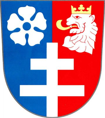 V modro - červeně polceném štítě vyrůstající stříbrný patriarší kříž provázený nahoře vpravo stříbrnou růží s prázdným semeníkem a vlevo korunovanou stříbrnou lví hlavou se zlatým jazykem. Znak Přibyslavice