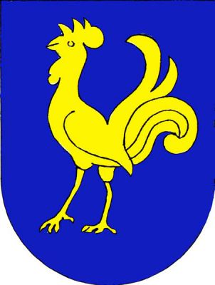 V modrém štítě zlatý kohout. Znak Pržno