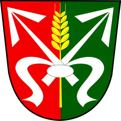 V červeno-zeleně polceném štítě dvě zkřížené stříbrné střely se zavinutím, podložené zlatým obilným klasem. Znak Radslavice