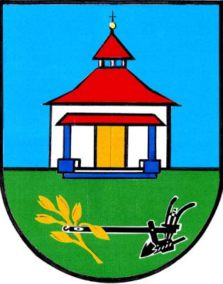 V modrém štítě na zeleném trávníku stříbrná kaple s hnědými zavřenými dveřmi a červenou stanovou střechou s červenou věžičkou zakončenou zlatou makovicí s černým křížkem. V trávníku pluh přirozené barvy přeložený zlatým ovesným klasem. Znak Rataje