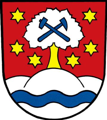 V červeném štítě na stříbrném trojvrší s modrým vlnitým břevnem stříbrný listnatý strom se zlatým kmenem provázený dolů do oblouku šesti zlatými hvězdami. V koruně stromu kosmý mlátek šikmo podložený želízkem, obojí modré. Znak Ruda nad Moravou