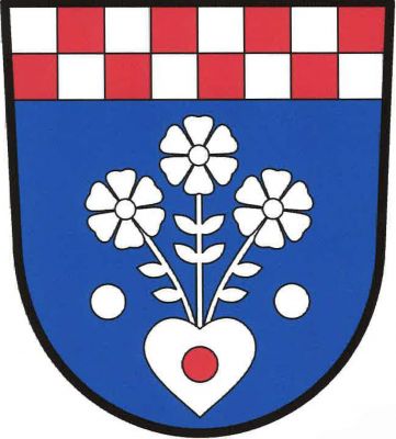 V modrém štítě pod stříbrno-červeně šachovanou hlavou srdce kvetoucí třemi šestilistými květy na stoncích s listy, provázené po stranách koulemi, vše stříbrné. V srdci červená koule. Znak Rychnov na Moravě