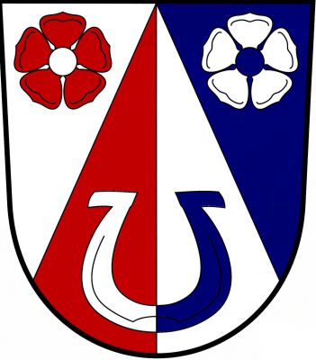Ve stříbrno-modře polceném štítě červeno-stříbrně polcený hrot provázený vpravo červenou růží se stříbrným semeníkem, vlevo stříbrnou růží s modrým semeníkem, v hrotu obrácená stříbrno-modře polcená podkova. Znak Slapy