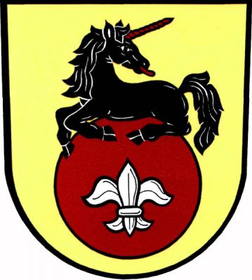Ve zlatém štítě na červené kouli se stříbrnou lilií ležící černý odvrácený jednorožec s červeným rohem a jazykem. Znak Slezské Pavlovice