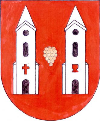 V červeném štítě dvě stříbrná kostelní průčelí s černými okny a dveřmi. V pravém latinský kříž, v levém kalich, obojí červené, mezi věžemi zlatý vinný hrozen. Znak Soběhrdy
