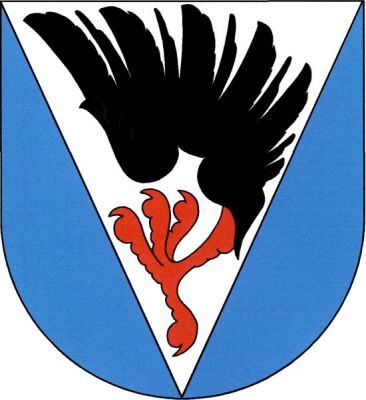 V modrém štítě stříbrný klín, v něm červený černě okřídlený spár. Znak Soutice