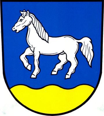 V modrém štítě nad zlatou vlnitou patou kráčející stříbrný kůň. Znak Střítež