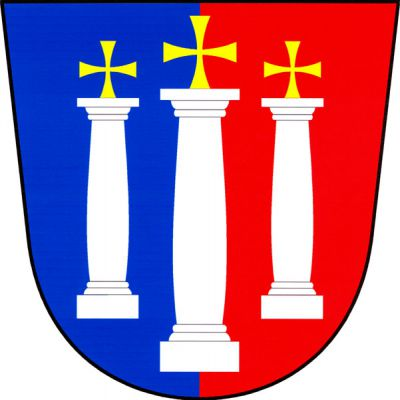 V modro-červeně polceném štítě tři stříbrné toskánské sloupy, prostřední vyšší, završené zlatými tlapatými křížky. Znak Střížovice