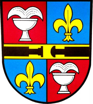 Červeno-modře čtvrcený štít, v 1. a 4. poli stříbrná tryskající fontána, ve 2. a 3. poli zlatá lilie, přes štít zlaté břevno se dvěma černými železničními nárazníky, pravý plochý, levý vypouklý. Znak Studénka