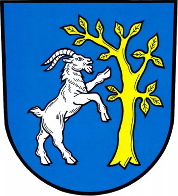 V modrém štítě doleva obrácený stříbrný kozel ve skoku ku zlatému vykořeněnému listnatému stromu. Znak Študlov