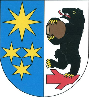 V modro-stříbrně polceném štítě vpravo osmihrotá hvězda nad třemi (2, 1) hvězdami, vše zlaté, vlevo na položené červené ostrvi se dvěma suky vzpřímený černý medvěd se zlatou zbrojí, držící předními tlapami bochník chleba bez patky přirozené barvy. Znak Teplýšovice