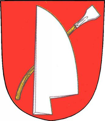 V červeném štítě stříbrná vztyčená radlice šikmo podložená stříbrnou vztyčenou otkou na zlaté násadě. Znak Tištín