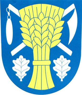 V modrém štítě zlatý obilný snop nahoře podložený kosmo cepem a šikmo kosou a dole provázený dvěma vztyčenými dubovými listy, vše stříbrné. Znak Třesovice
