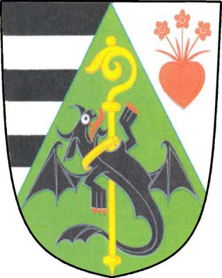 Ve štítě zelený hrot, v něm je ke zlaté berle závitem doprava zlatým obojkem přikován černý ďábel s červenou zbrojí. Pravé pole pětkrát černo-stříbrně dělené, v levém stříbrném poli srdce kvetoucí třemi květy, vše červené. Znak Únanov