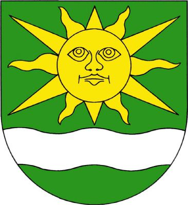 V zeleném štítě nad sníženým stříbrným vlnitým břevnem zlaté slunce s tváří a dvanácti paprsky, střídavě přímými a vlnitými. Znak Vědomice